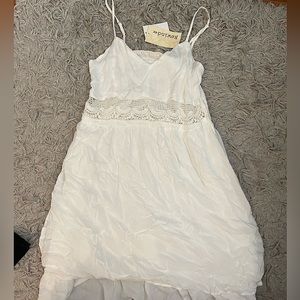Brand new Rewind>> white style dress!!! Size Large and perfect for any occasion!